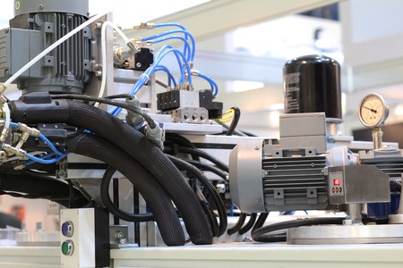 Factory equipment. Many wires, compressors. Industrial Automotive Plant No people