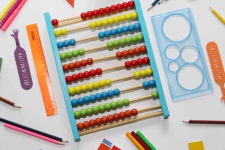 Soon back to school. Colored abacus, rulers, pencils and pens. Preparation for school. September 1. School set of items for the student.の写真素材