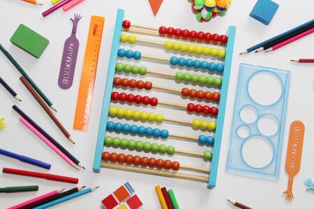 Soon back to school. Colored abacus, rulers, pencils and pens. Preparation for school. September 1. School set of items for the student.の写真素材
