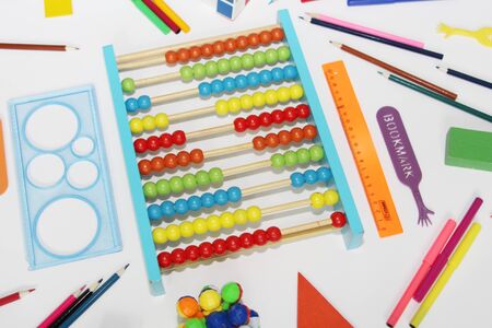 Soon back to school. Colored abacus, rulers, pencils and pens. Preparation for school. September 1. School set of items for the student.の写真素材