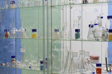 Chemical laboratory. Flasks and dishes with solutions ready for research activities. Laboratory test tubes and flasks.の写真素材
