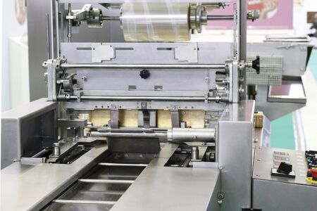 Automatic packing machine. Filling equipment. Packing in a transparent cellophane film. Designing...