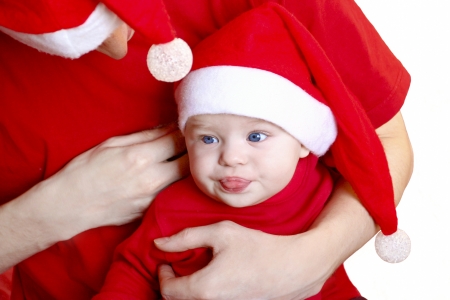 A small child and a man in the costume of Santa Claus の写真素材