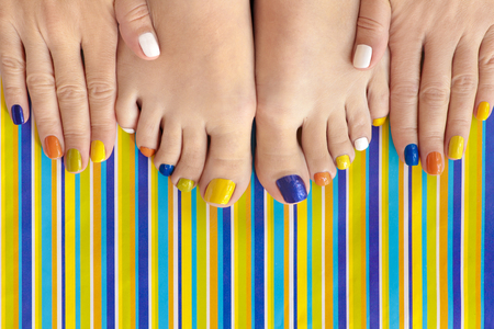 Colorful manicure on striped background. Striped design.の写真素材