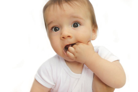 Funny baby boy on a light background.の写真素材