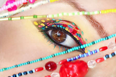 Creative spotty eye makeup close-up.の写真素材