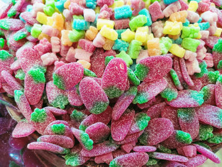 Multicolored sweet and sour candies of different shapes and colors.の写真素材