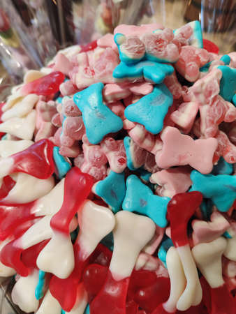 Multicolored sweet and sour candies of different shapes and colors.の写真素材