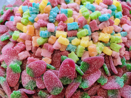 Multicolored sweet and sour candies of different shapes and colors.の写真素材