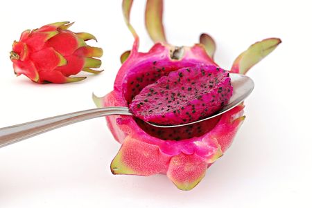 A dragon fruit eaten with a spoonの写真素材