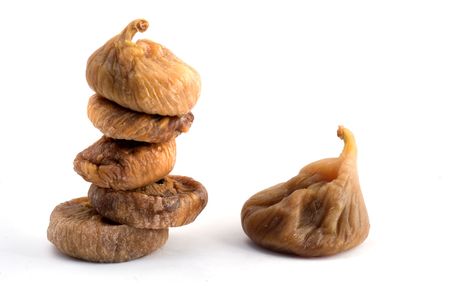 Dried figs isolated on white backgroundの写真素材