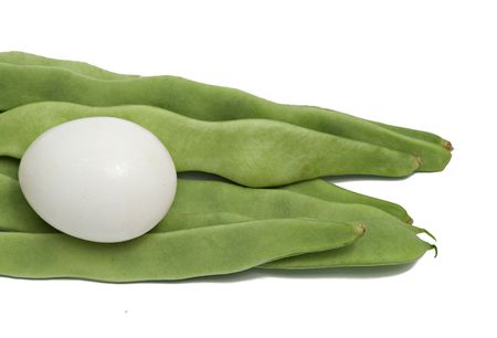 Green beans and egg isolated on white background