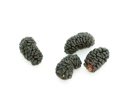 Black mulberries isolated on white backgroundの写真素材