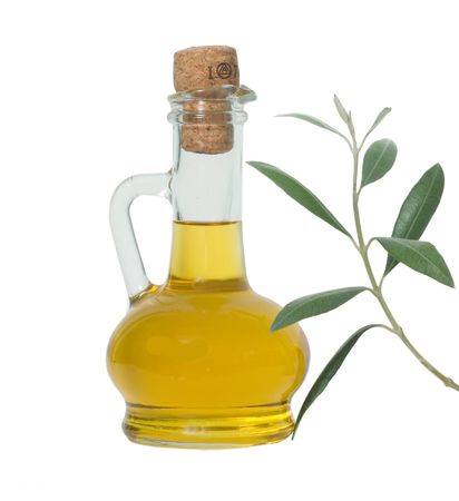 Bottle of olive oil and olive branch isolated on white backgroundの写真素材