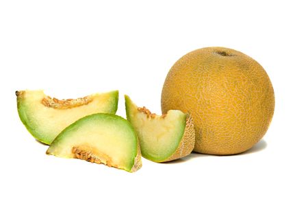 Melon and melon segments isolated on white backgroundの写真素材
