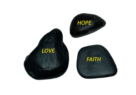 Rocks with inscriptions "faith"," hope"; and "love"の写真素材