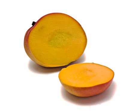 Mango sections isolated on white backgroundの写真素材