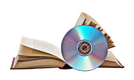 Open book  and DVD  as symbols of old and new methods of information storageの写真素材