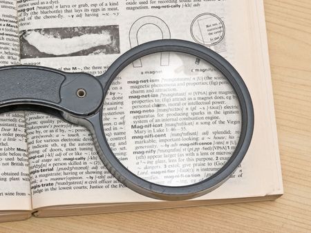 Magnifier glass and dictionaryの写真素材