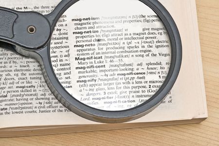 Magnifier glass and dictionaryの写真素材