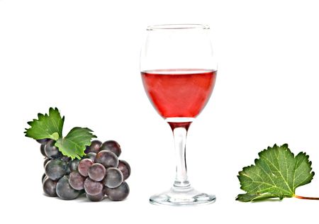 Goblet with wine and grapevine isolated on white background の写真素材