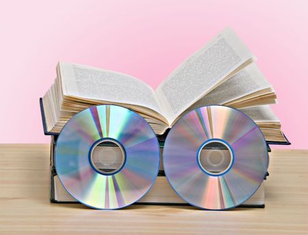 books  and DVD  as symbols of old and new methods of information storageの写真素材
