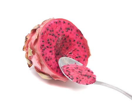 A dragon fruit eaten with a spoonの写真素材