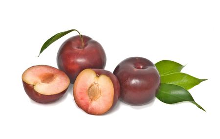 Plum and sections isolated on white backgroundの写真素材