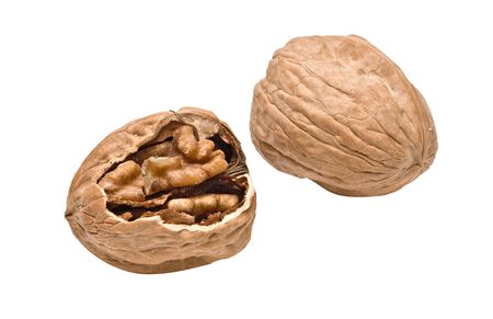Cracked walnut isolated on white backgroundの写真素材