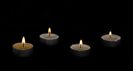 Four candles in darknessの写真素材