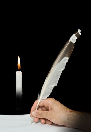  Writer writing with feather and candleの写真素材