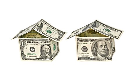 Two money houses isolated on white backgroundの写真素材