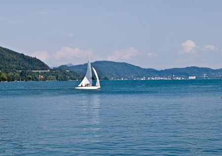 Boat sailling along shore