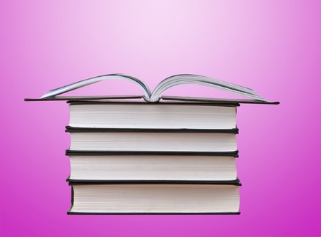 Pile of books isolated on background