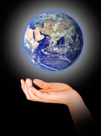 Hand with planet earthの写真素材