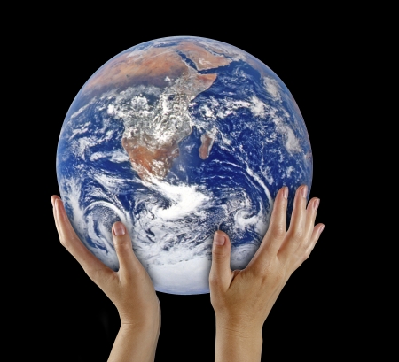 Planet earth on palmsの写真素材
