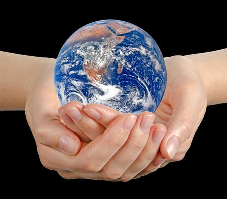 Planet earth on palms.の写真素材