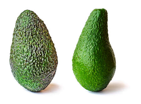 Close up of avocados isolated on white background