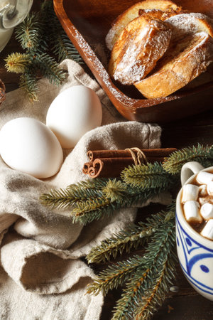 Cozy home-made breakfast, winter holidays, food in the style of hygge. Croutons with powdered sugar...
