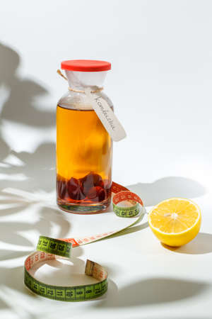 Kombucha, a healthy carbonated tea. It is a drink that is made by fermenting tea, sugar, fungi, and...