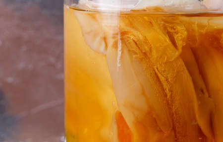 Kombucha mushroom in a glass jar. Close-up, horizontal