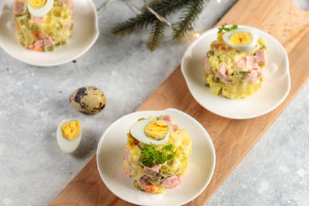Buffet portions of Olivier salad, a traditional Russian salad that is prepared for the New Year. Close- up, selective focusの写真素材