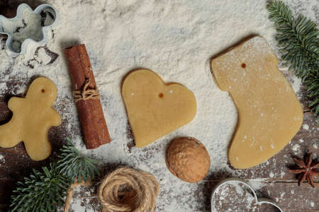 Preparation of gingerbread. Preparations for gingerbread dough, scattered flour, cinnamon, nuts and...