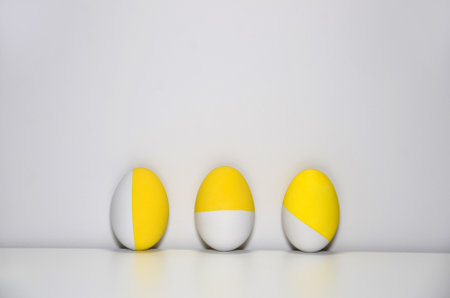 Three easter eggs. Trendy colors. Gray backroundの写真素材