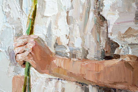 Girl with a flower in her hand on a white background.の写真素材