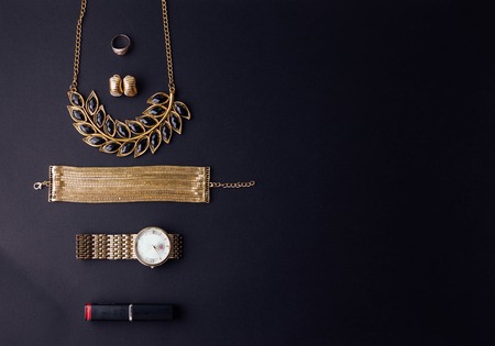 Set of stylish accessories on black backgroundの写真素材