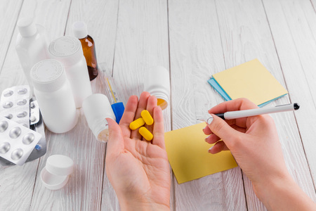 Doctor writing a recipe for treatment. Medicine. Health careの写真素材
