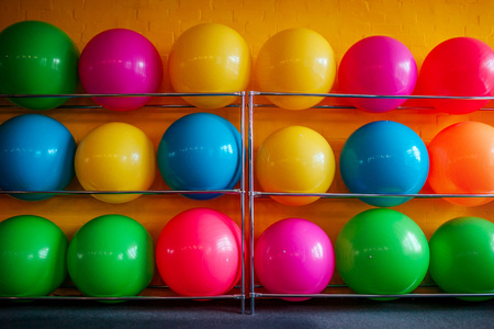 Set of colorful fitness balls at the gymの写真素材