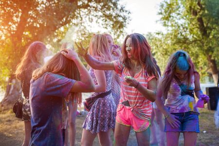 Myrhorod, Ukraine - June 16, 2019: Group of a young people throwing paints on indian Holi festival of colorsのeditorial素材