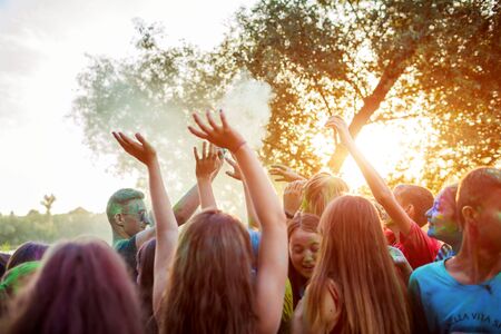 Myrhorod, Ukraine - June 16, 2019: Group of a young people throwing paints on indian Holi festival of colorsのeditorial素材